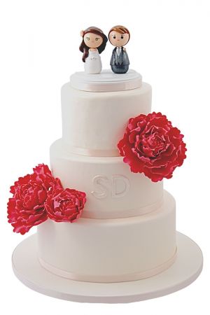 Beautiful wedding cake with peonies